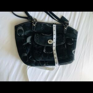 Neatly used Coach Hand bag.See pictures for measurements